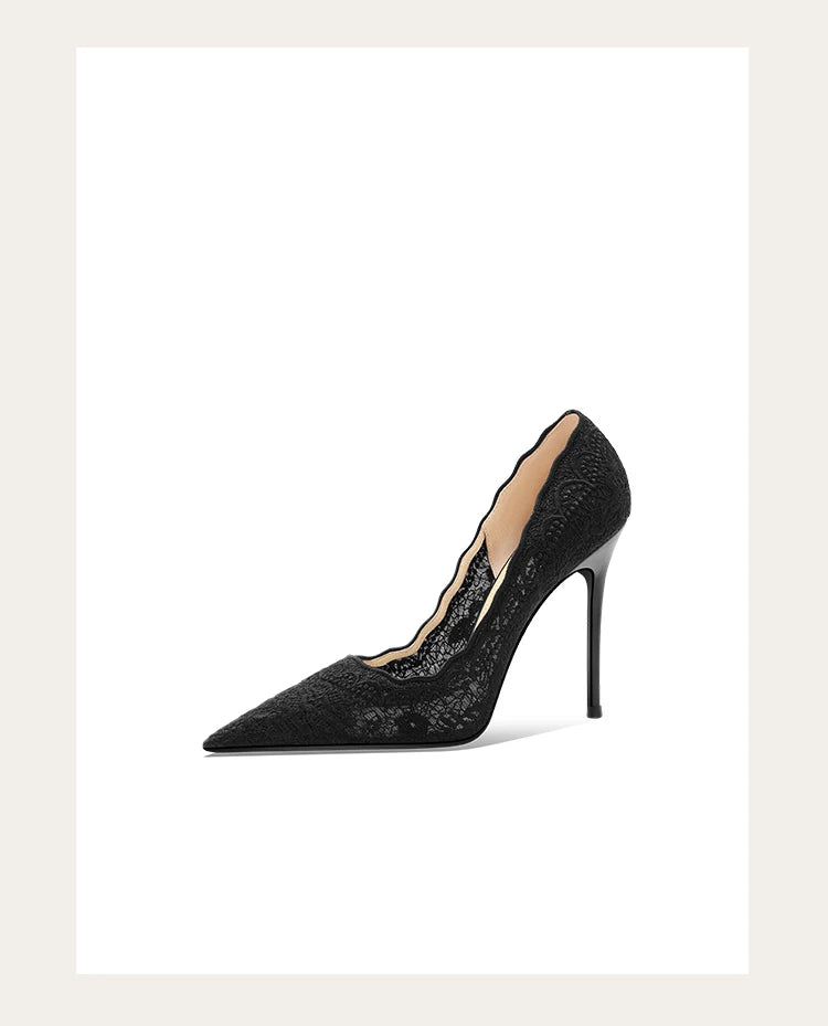 Black high-heeled shoe with a pointed toe on a white background