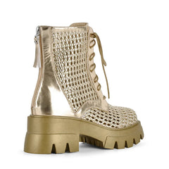 Side view of gold mesh platform lace-up ankle boots