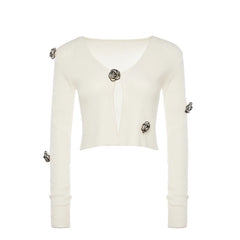 White cropped cardigan with decorative buttons