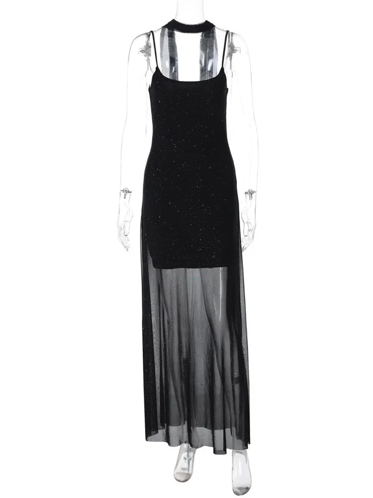 Black dress with sheer overlay on a mannequin against a white background
