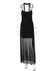 Black dress with sheer overlay on a mannequin against a white background