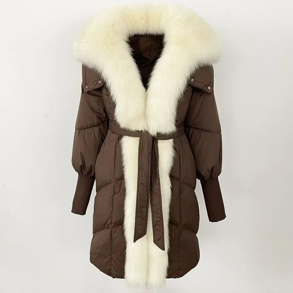 Brown winter coat with white fur trim on a white background