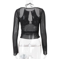 Black sheer long-sleeve top on a mannequin against a white background