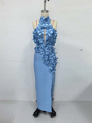 Light blue evening gown with floral embellishments on a mannequin against a white background