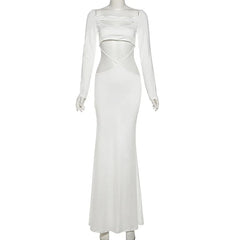 White evening gown on a mannequin against a white background