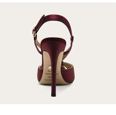 Maroon high-heeled sandal on a white background