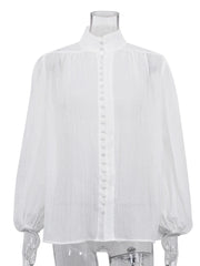 White blouse on a mannequin against a white background