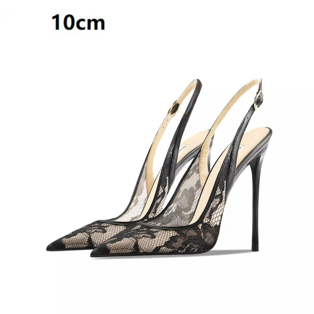Black lace high-heeled shoes on a white background