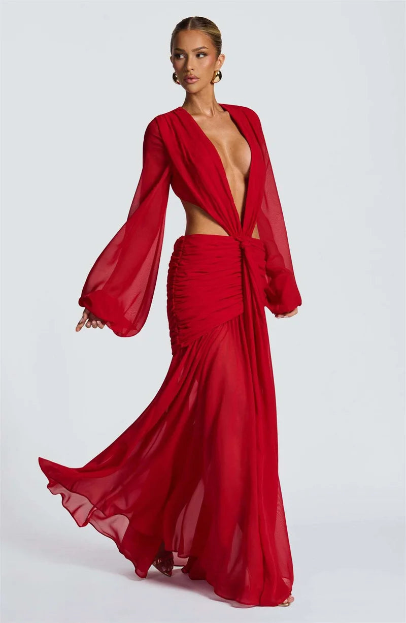 Red evening gown with long sleeves on a white background