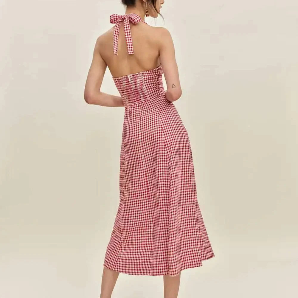 Red and white checkered dress with a bow detail on a beige background