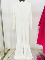 Back view of white long-sleeve jumpsuit with rhinestone embellished cutout