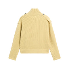 Yellow ribbed sweater on a white background