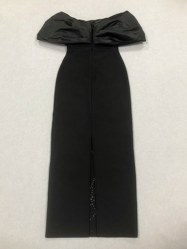 Black off-shoulder dress with a textured background