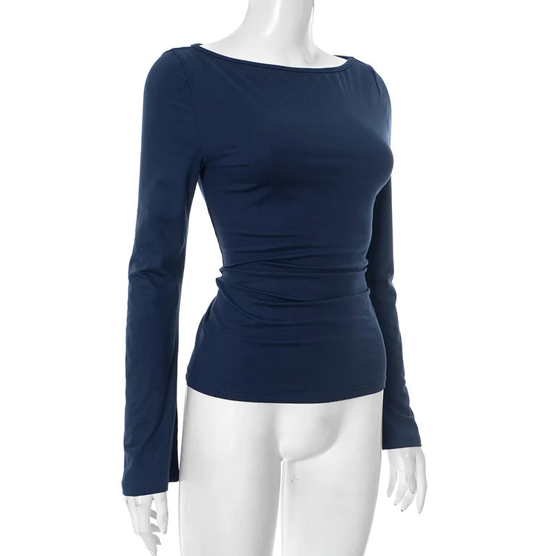 Navy blue long-sleeve top on a white mannequin against a white background
