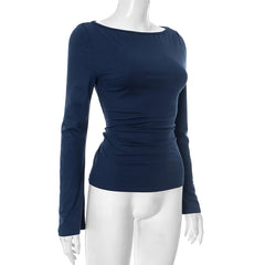 Navy blue long-sleeve top on a white mannequin against a white background