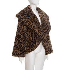 Leopard print fur coat on a mannequin against a white background