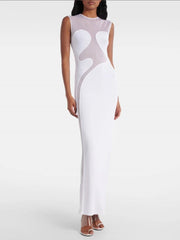 Woman wearing a white and gray dress on a white background