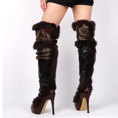 Model wearing over the knee fur trim platform boots
