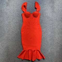Red dress with lobster-like design on a gray background