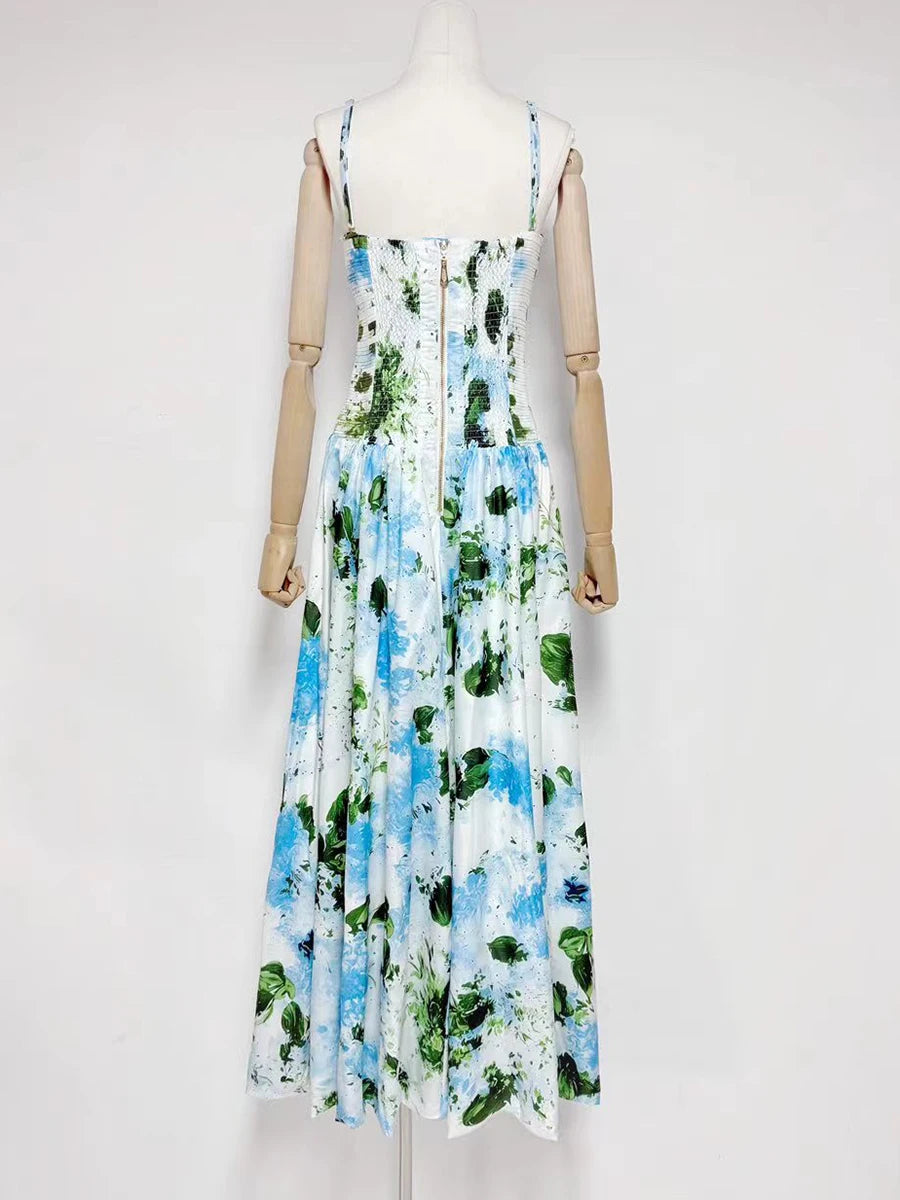Floral dress on a mannequin against a white background