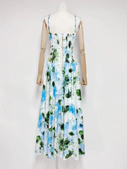 Floral dress on a mannequin against a white background