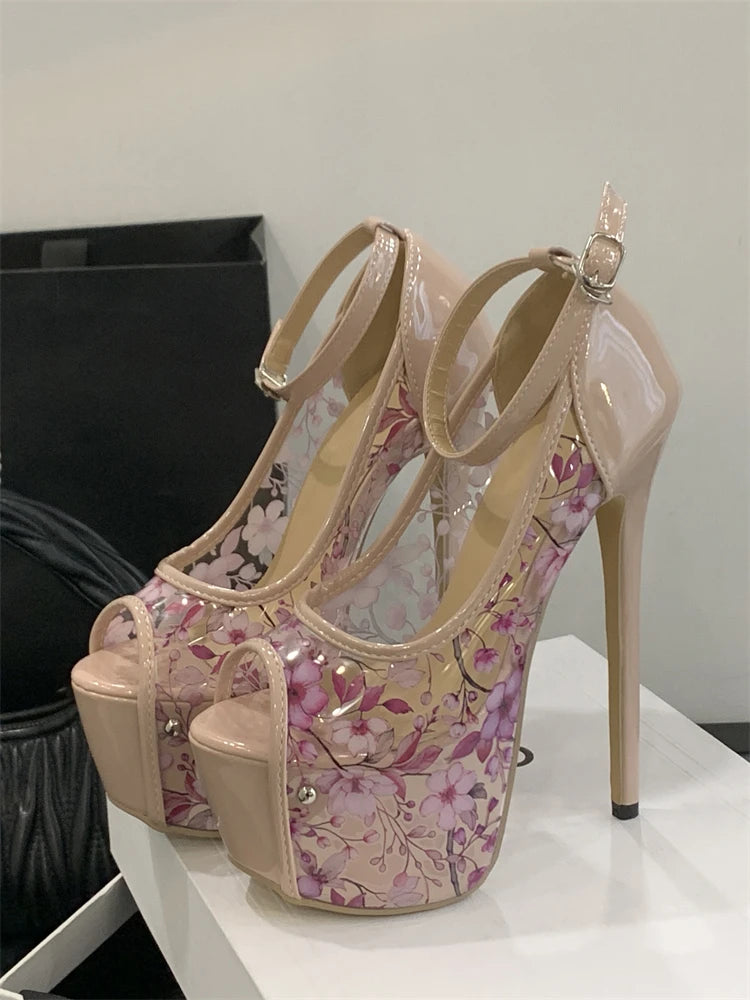 High-heeled shoes with floral design on a white surface
