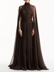 Brown evening gown with cape on a white background