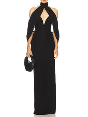 Black evening gown with cut-out design on a white background
