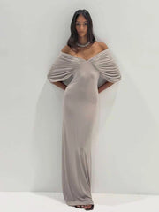 Ruched off-shoulder v-neck maxi dress in matte gray fabric.