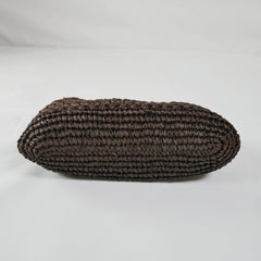 Coffee woven oval pillow on a white background
