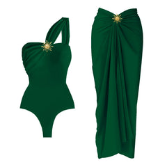 Green one-shoulder draped bodysuit and wrap skirt set with sunburst embellishment