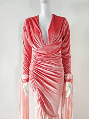 Pink velvet dress on a mannequin