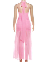 Pink evening gown on a mannequin against a white background