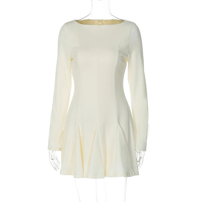 White long-sleeve dress on a mannequin against a white background