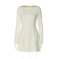 White long-sleeve dress on a mannequin against a white background