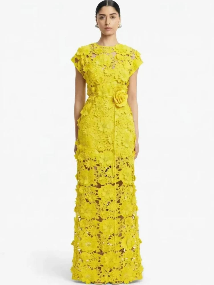 Yellow floral appliqu� maxi dress with cap sleeves and high slit.