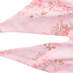 Pink floral fabric with roses and leaves