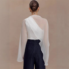 Asymmetrical draped cape sleeve blouse with sheer overlay back view