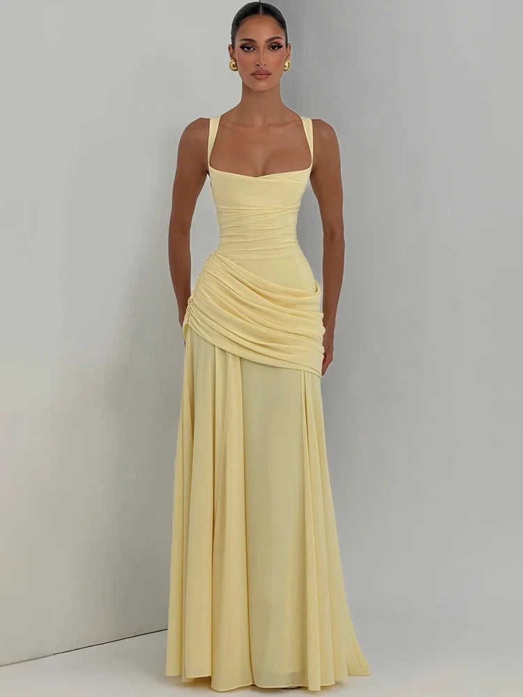 Full body view of yellow square neck drape waist floor-length dress