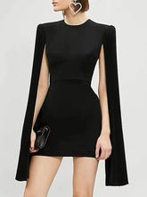 Black mini dress with pleated cape sleeves