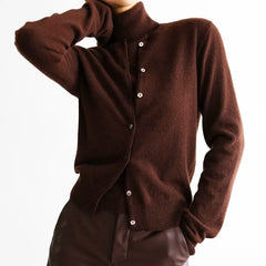 Brown cardigan with button details on a white background