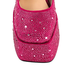Detail of the squared toe and platform on the rhinestone Mary Jane heels.