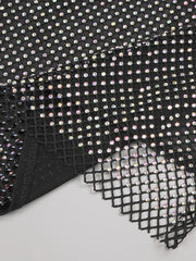 Black mesh fabric with small rhinestones on a white background