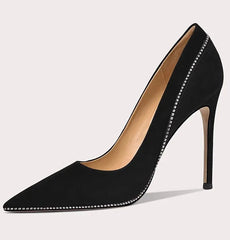 Black high-heeled shoe on a light gray background