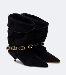 Pointed toe wrinkled ankle boots in black suede with gold hardware