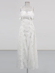 White lace dress on a mannequin against a gray background