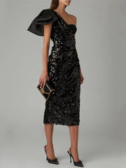 Sequin black midi dress with modern bow shoulder detail