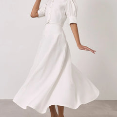 White dress with a plain background