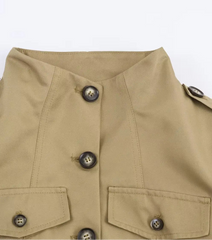 Close-up of a beige jacket with button details