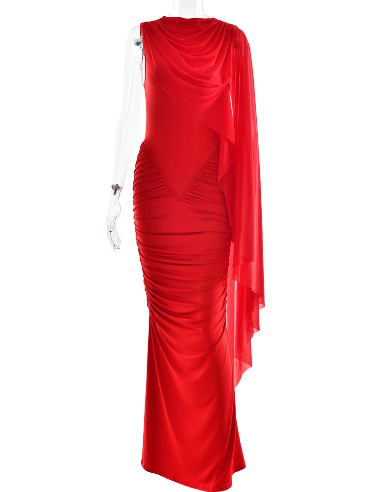 Red evening gown on a mannequin against a white background